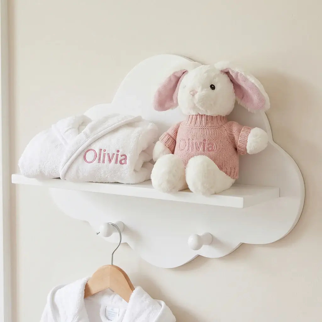 Unique baby shower gift ideas for girls, including a personalized bunny bathrobe set