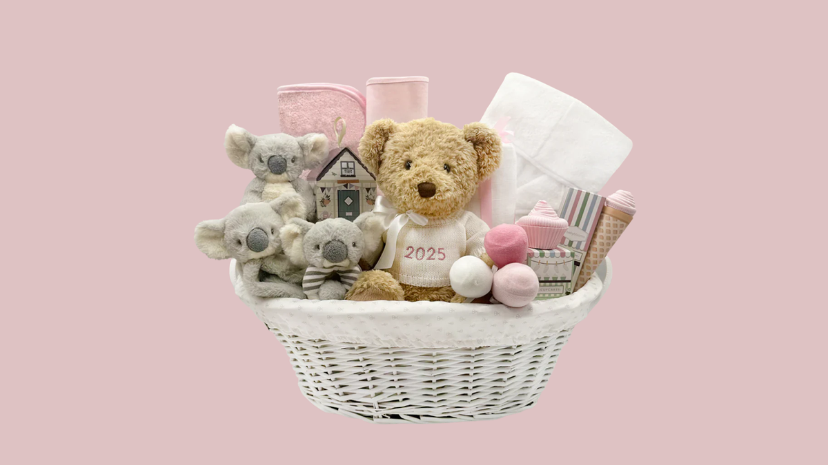 Luxury baby girl gift basket with soft essentials and keepsakes for newborns