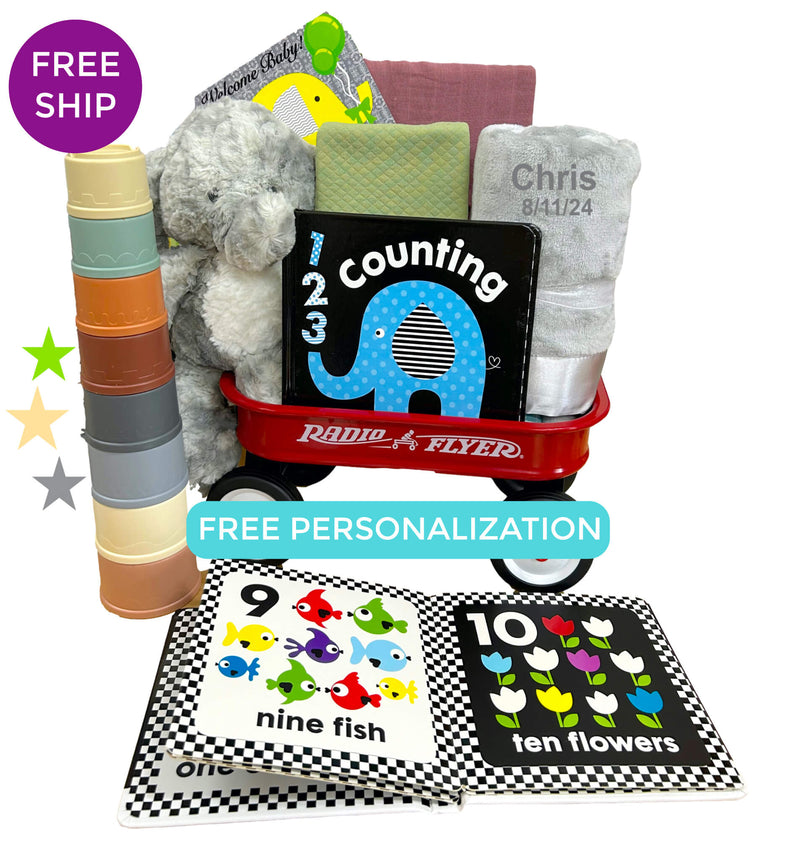 Classic Radio Flyer wagon filled with gifts for new babies.