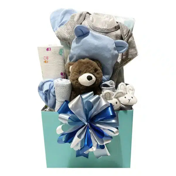 Baby Boy Gift Box with baby boy essentials including plush bunny booties, plush teddy bear, receiving baby blanket and more.