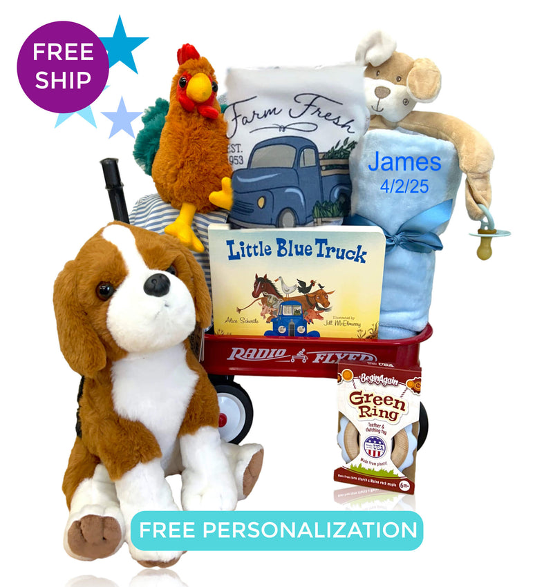 Baby boy theme gift wagon filled featuring a plush puppy and personalized baby essentials.