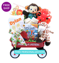 Welcome baby mini-wagon with newborn essential products.