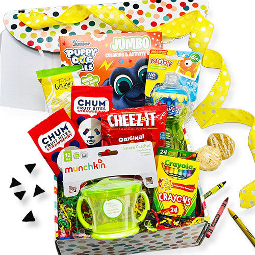 Toddler gift box with Jumbo Puppy Dog Pals coloring book, Crayola crayons, Cheez-It, Chum fruit snacks, Nuby sippy cup, Munchkin snack catcher, and lemon cookies in a colorful polka dot box with yellow ribbon