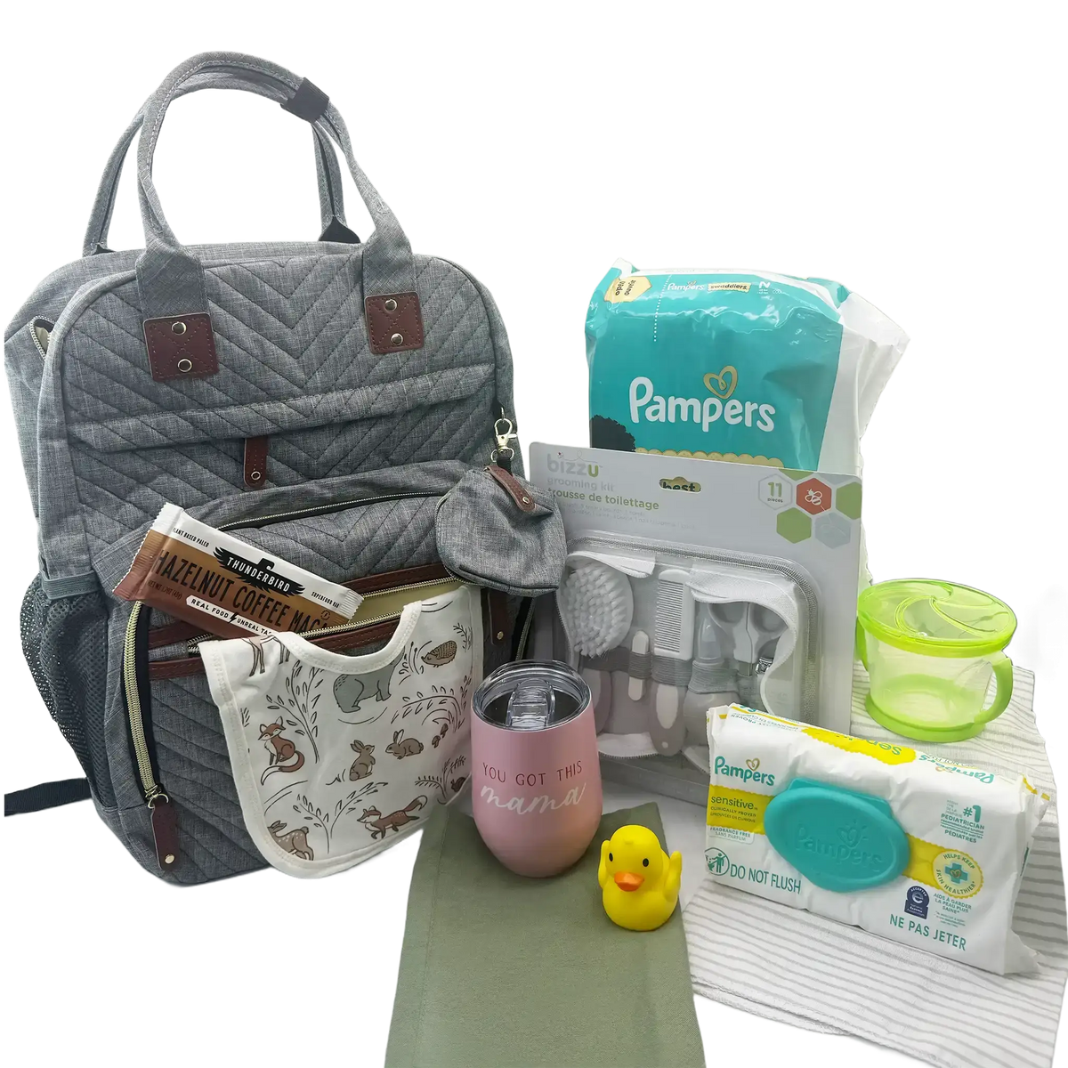 Unique baby gift diaper bag backpack packed with Pampers diapers and wipes, receiving blanket, grooming kit, snack catcher and “You Got This Momma” wine tumbler