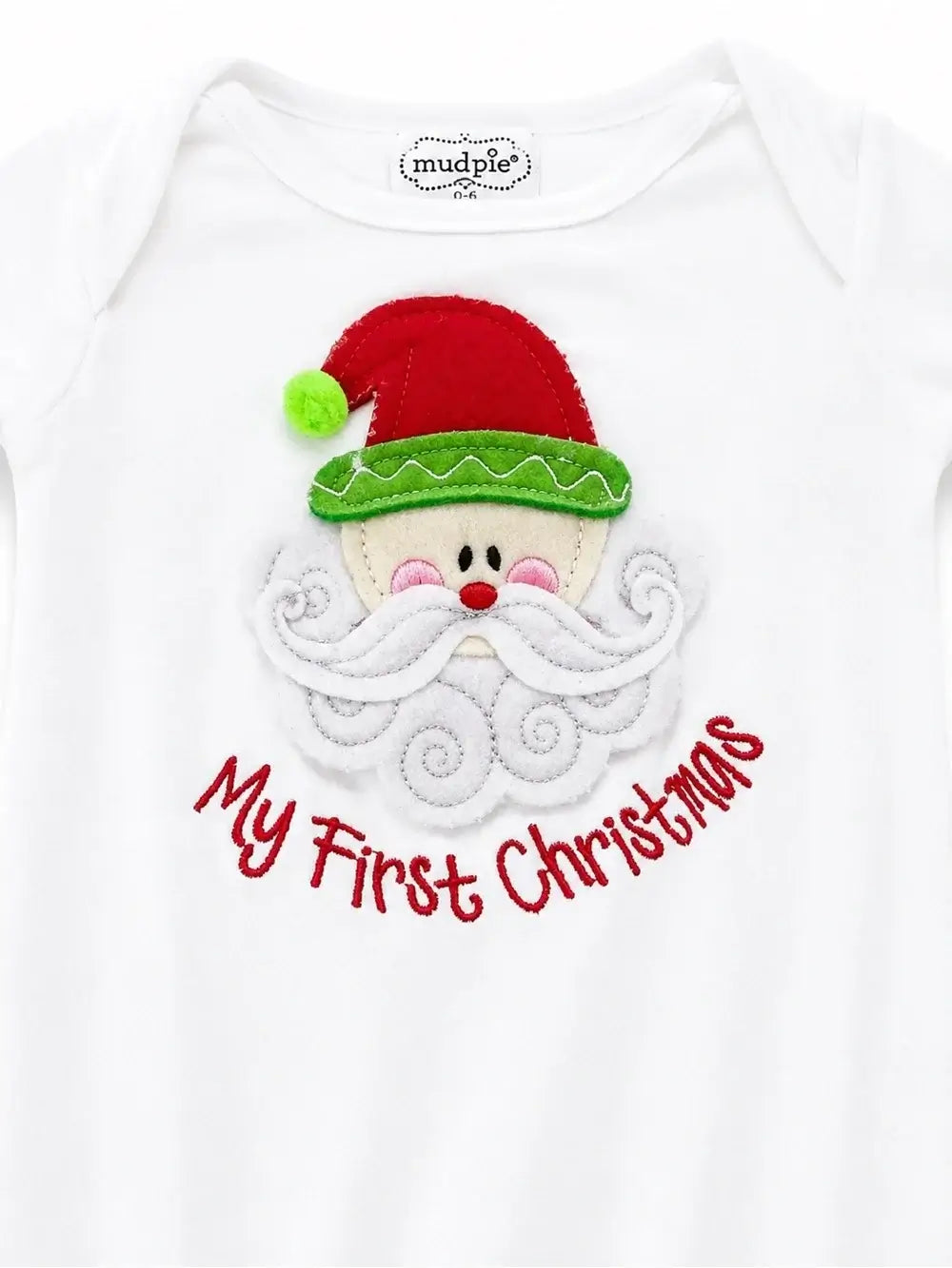 Close up of Mud Pie My First Christmas white cotton baby sleeper gown with felt Santa applique