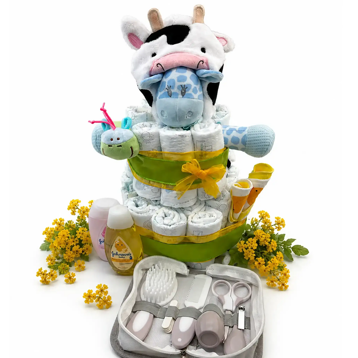 Gender-neutral baby shower diaper cake with plush cow and giraffe stuffed animals, Johnson's baby shampoo and lotion, grooming kit with nail clippers and scissors, squirty bath toy, yellow ribbon, and yellow wildflowers