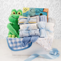 Baby boy gift basket with plush frog, bodysuits, sleep gown, hooded towel, washcloths and board book in a decorative basket