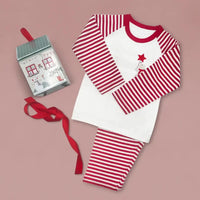 Candy Cane Cub baby and toddler Christmas pajamas with red and white stripes and a Christmas bear design
