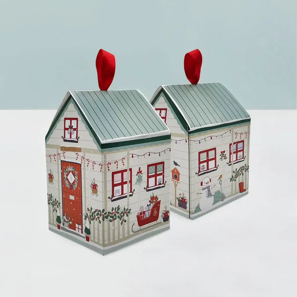 Candy Cane Cub Christmas pajamas in a festive illustrated gift box