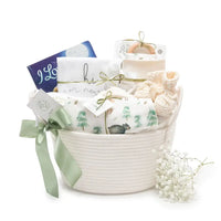 Magical Forest organic baby gift basket with book and swaddle — 9-piece neutral layette set