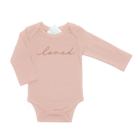 Certified organic mauve baby bodysuit with "loved" water-based ink illustration
