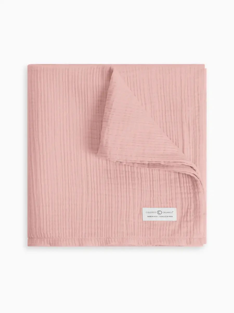 GOTS-certified organic cotton mauve muslin swaddle 46x46 inches
