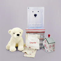 Personalized polar bear Christmas pajamas, Perry Polar Bear soft toy, and A Polar Bear in the Snow storybook