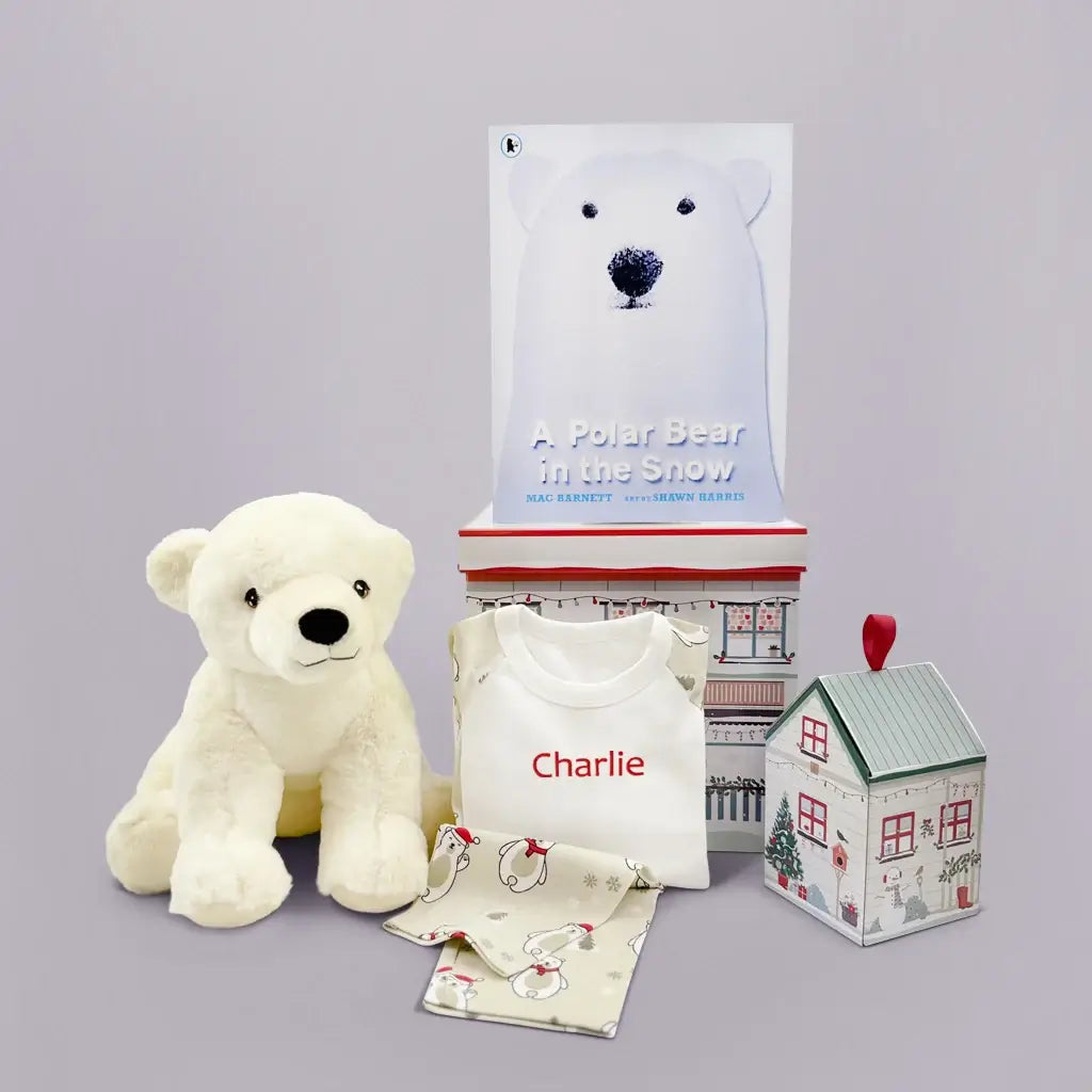 Personalized polar bear Christmas pajamas, Perry Polar Bear soft toy, and A Polar Bear in the Snow storybook
