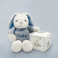 Personalized blue eco bunny in blue knitted jumper with bone china money box keepsake gift set for baby boys, presented in an illustrated gift box with satin ribbon