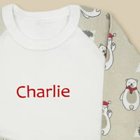Close-up of name personalization on polar bear Christmas pajamas