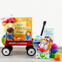 Ready, Set, Play! Red Wagon Gift Set with Radio Flyer wagon, soft activity toy, stacking toy, rattle, and board book