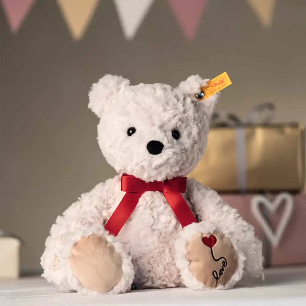 White Steiff Jimmy Love teddy bear sitting upright